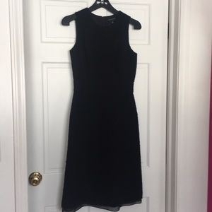 Pretty 100% wool dress with sheer at hem